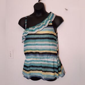 B Wear striped one shoulder top